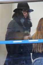 COURTNEY COX at LAX Airport in Los Angeles 12/29/2015
