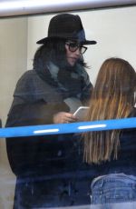 COURTNEY COX at LAX Airport in Los Angeles 12/29/2015