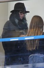 COURTNEY COX at LAX Airport in Los Angeles 12/29/2015