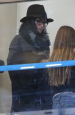 COURTNEY COX at LAX Airport in Los Angeles 12/29/2015