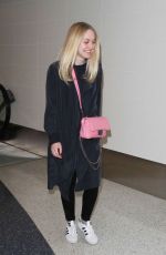 DAKOTA FANNING at Los Angeles International Airport 12/30/2015