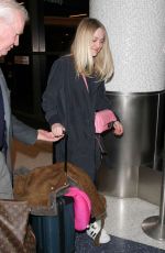 DAKOTA FANNING at Los Angeles International Airport 12/30/2015