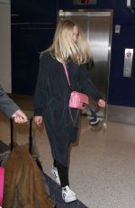 DAKOTA FANNING at Los Angeles International Airport 12/30/2015