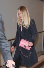 DAKOTA FANNING at Los Angeles International Airport 12/30/2015