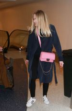 DAKOTA FANNING at Los Angeles International Airport 12/30/2015