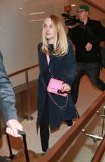 DAKOTA FANNING at Los Angeles International Airport 12/30/2015