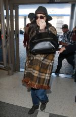 DEMI MOORE at Los Angeles International Airport 12/02/2015