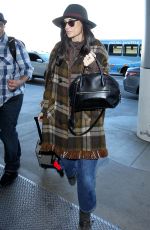 DEMI MOORE at Los Angeles International Airport 12/02/2015