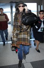 DEMI MOORE at Los Angeles International Airport 12/02/2015