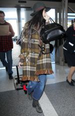 DEMI MOORE at Los Angeles International Airport 12/02/2015