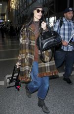DEMI MOORE at Los Angeles International Airport 12/02/2015