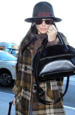 DEMI MOORE at Los Angeles International Airport 12/02/2015