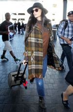 DEMI MOORE at Los Angeles International Airport 12/02/2015