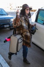 DEMI MOORE at Los Angeles International Airport 12/02/2015