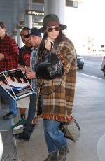 DEMI MOORE at Los Angeles International Airport 12/02/2015
