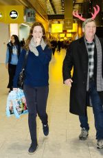 EMILY BLUNT at Heathrow Airport in London 12/23/2015