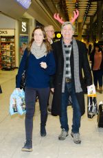 EMILY BLUNT at Heathrow Airport in London 12/23/2015