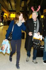 EMILY BLUNT at Heathrow Airport in London 12/23/2015
