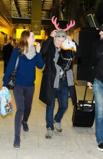 EMILY BLUNT at Heathrow Airport in London 12/23/2015