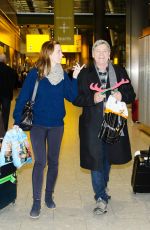 EMILY BLUNT at Heathrow Airport in London 12/23/2015