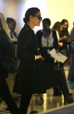 EMMY ROSSUM Arrives at Los Angeles International Airport 12/19/2015