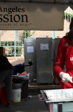 EMMY ROSSUM at Annual Mission Christmas Dinner in Los Angeles 12/24/2015