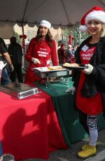 EMMY ROSSUM at Annual Mission Christmas Dinner in Los Angeles 12/24/2015