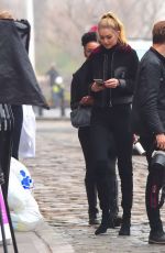 GIGI HADID on the Set of Maybelline Photoshoot at Brooklyn Bridge in New York 12/14/2015