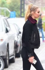 GIGI HADID on the Set of Maybelline Photoshoot at Brooklyn Bridge in New York 12/14/2015