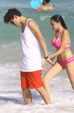 MADISON BEER in Pink Bikini at a Beach in miami 12/29/2015