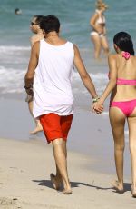 MADISON BEER in Pink Bikini at a Beach in miami 12/29/2015