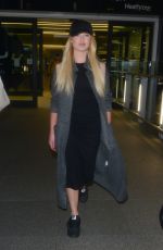 JORGIE PORTER at Heathrow Airport in London 12/09/2015