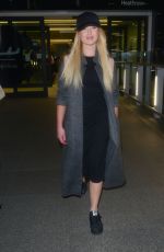 JORGIE PORTER at Heathrow Airport in London 12/09/2015
