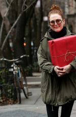 JULIANNE MOORE Carrying a Christmas Present in New York 12/17/2015