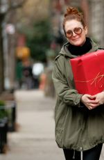 JULIANNE MOORE Carrying a Christmas Present in New York 12/17/2015