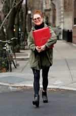 JULIANNE MOORE Carrying a Christmas Present in New York 12/17/2015