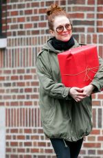 JULIANNE MOORE Carrying a Christmas Present in New York 12/17/2015