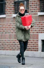 JULIANNE MOORE Carrying a Christmas Present in New York 12/17/2015