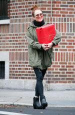 JULIANNE MOORE Carrying a Christmas Present in New York 12/17/2015