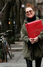JULIANNE MOORE Carrying a Christmas Present in New York 12/17/2015