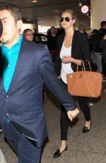 KATE UPTON Arrives at Los Angeles International Airport 12/11/2015