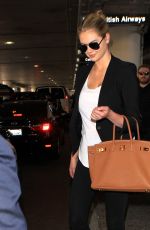 KATE UPTON Arrives at Los Angeles International Airport 12/11/2015