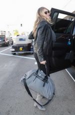 KATE UPTON at LAX Airpor in Los Angeles 12/22/2015