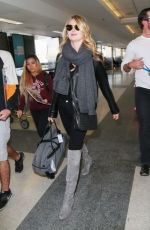 KATE UPTON at LAX Airpor in Los Angeles 12/22/2015