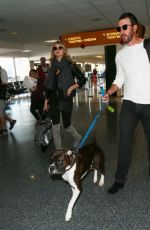 KATE UPTON at LAX Airpor in Los Angeles 12/22/2015