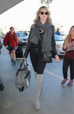 KATE UPTON at LAX Airpor in Los Angeles 12/22/2015