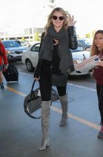KATE UPTON at LAX Airpor in Los Angeles 12/22/2015