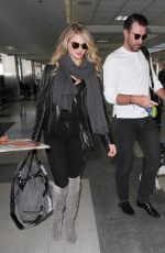 KATE UPTON at LAX Airport in Los Angeles 12/23/2015