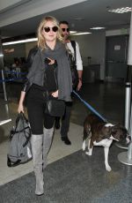 KATE UPTON at LAX Airport in Los Angeles 12/23/2015