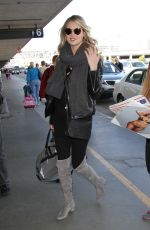 KATE UPTON at LAX Airport in Los Angeles 12/23/2015
